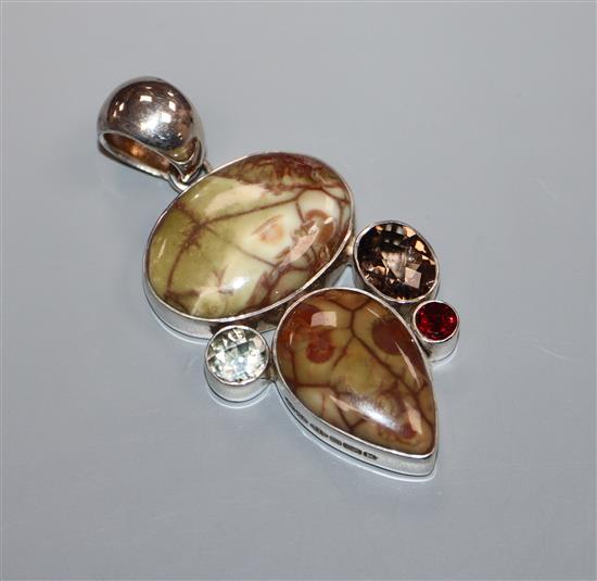 A modern silver, hardstone and gem set pendant by Pruden & Smith, with box.